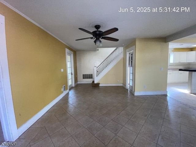 103 W Colfax Ave, Roselle Park Boro, NJ 07204 - unfurnished living room featuring ceiling fan, baseboards, stairs, tile patterned flooring, and crown molding