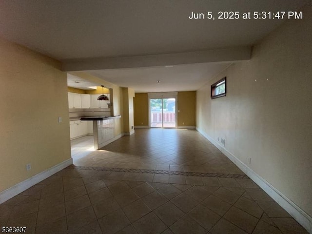 103 W Colfax Ave, Roselle Park Boro, NJ 07204 - unfurnished room with dark tile patterned floors and baseboards