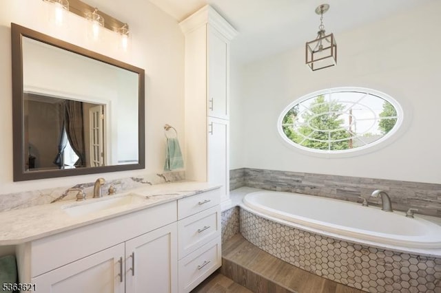 44 Shetland Dr, Clark Twp, NJ 07066 - full bathroom with vanity, a garden tub, and wood finished floors