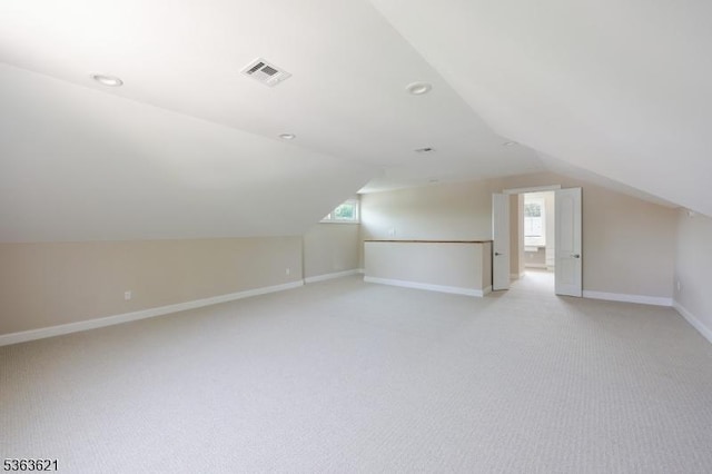 44 Shetland Dr, Clark Twp, NJ 07066 - additional living space with lofted ceiling, light carpet, and plenty of natural light