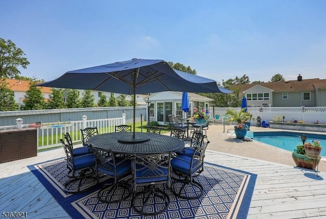 44 Shetland Dr, Clark Twp, NJ 07066 - wooden terrace with a fenced backyard and outdoor dining area