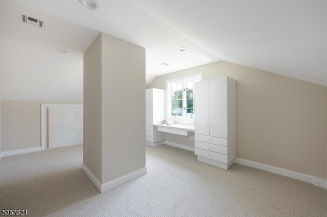 44 Shetland Dr, Clark Twp, NJ 07066 - bonus room featuring light carpet, lofted ceiling, and built in desk