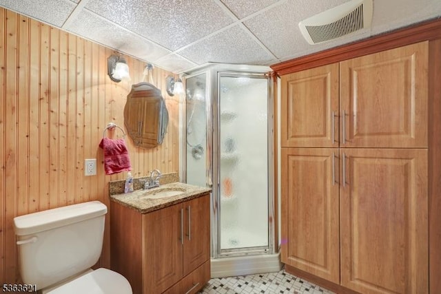44 Shetland Dr, Clark Twp, NJ 07066 - bathroom featuring a shower stall, vanity, wooden walls, and a paneled ceiling