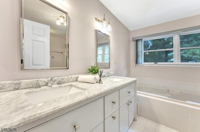 22 Flemming Dr, Hillsborough Twp, NJ 08844 - bathroom with double vanity, a garden tub, and tile patterned floors