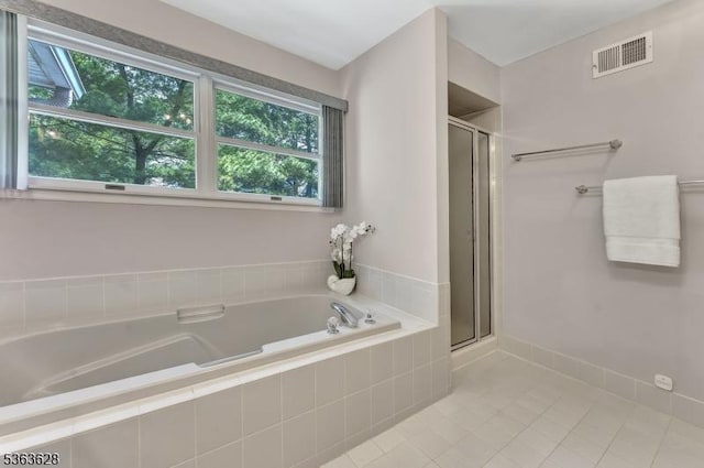 22 Flemming Dr, Hillsborough Twp, NJ 08844 - bathroom with tile patterned flooring, a stall shower, a garden tub, and healthy amount of natural light