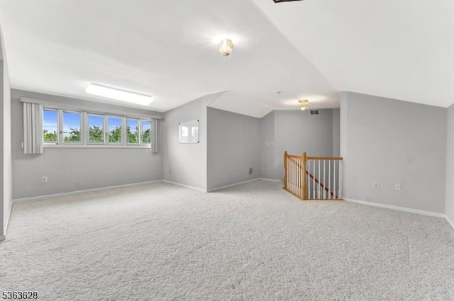 22 Flemming Dr, Hillsborough Twp, NJ 08844 - additional living space with carpet flooring and vaulted ceiling