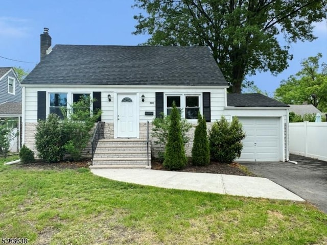 505 Beechwood Ave, Roselle Park Boro, NJ 07204 - view of front of property featuring driveway, a chimney, a garage, and a shingled roof
