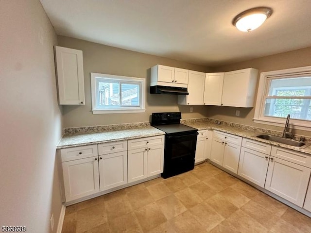 505 Beechwood Ave, Roselle Park Boro, NJ 07204 - kitchen featuring black range with electric cooktop, under cabinet range hood, white cabinets, and light stone counters
