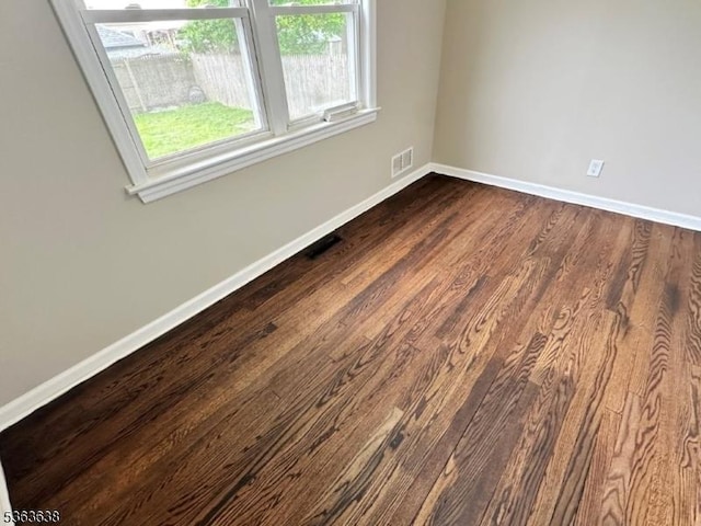 505 Beechwood Ave, Roselle Park Boro, NJ 07204 - spare room featuring baseboards and dark wood-style flooring