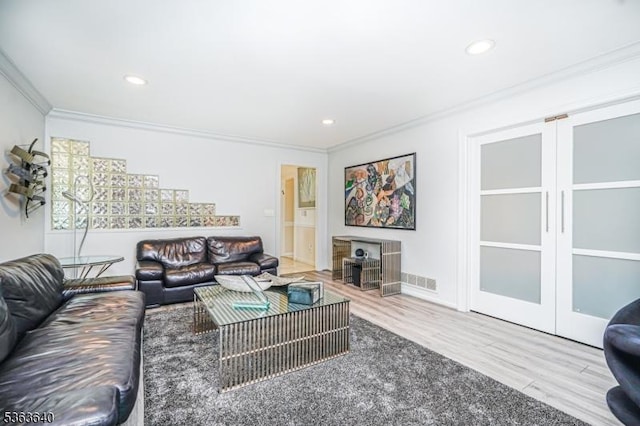 5 Leighton Dr, East Brunswick Twp, NJ 08816 - living area with crown molding, wood finished floors, and recessed lighting