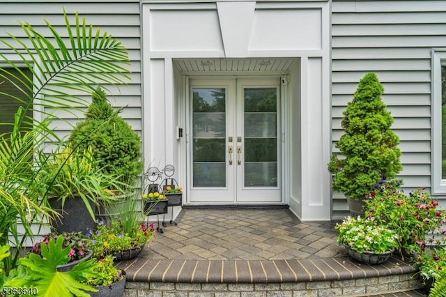 5 Leighton Dr, East Brunswick Twp, NJ 08816 - view of exterior entry with french doors and a patio