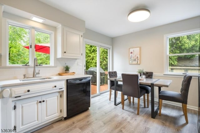 27 Brook Rd, New Providence Boro, NJ 07974 - kitchen with black dishwasher, healthy amount of natural light, and backsplash