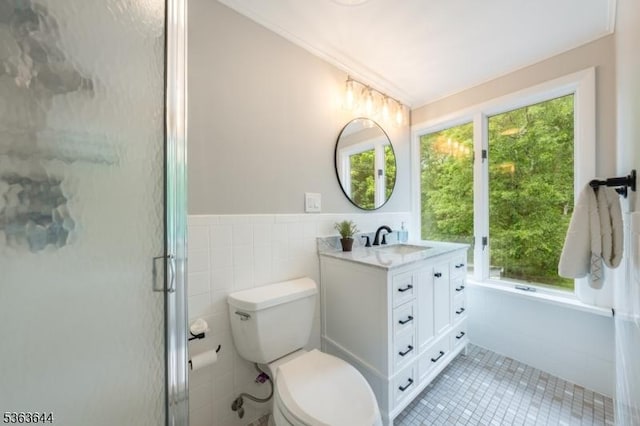 27 Brook Rd, New Providence Boro, NJ 07974 - full bath featuring vanity, healthy amount of natural light, tile patterned flooring, a shower with door, and tile walls