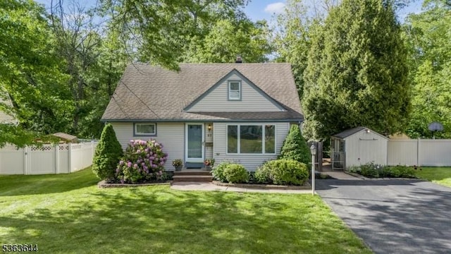 27 Brook Rd, New Providence Boro, NJ 07974 - view of front facade with a storage shed and roof with shingles