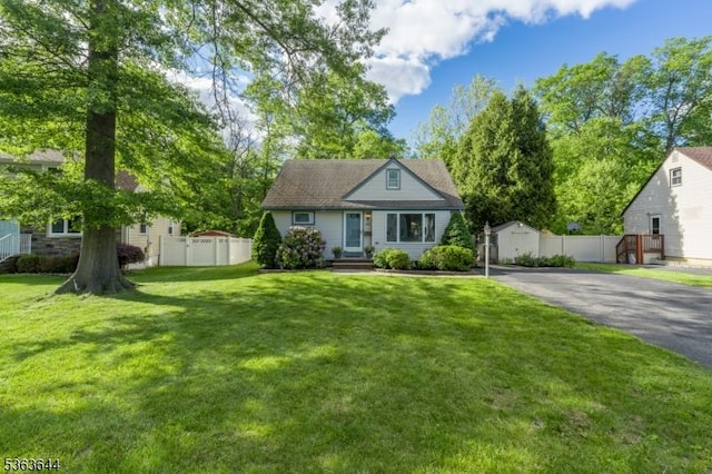 27 Brook Rd, New Providence Boro, NJ 07974 - view of front of property with a storage unit and driveway