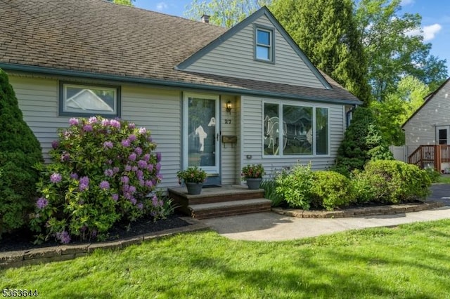 27 Brook Rd, New Providence Boro, NJ 07974 - bungalow-style home featuring a front lawn and roof with shingles