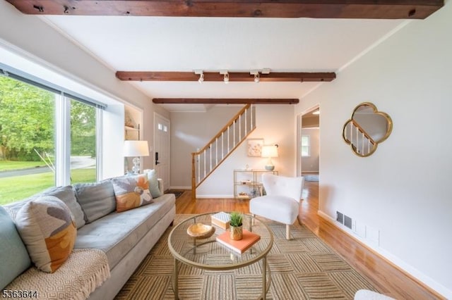 27 Brook Rd, New Providence Boro, NJ 07974 - living area featuring beamed ceiling, stairway, and wood finished floors