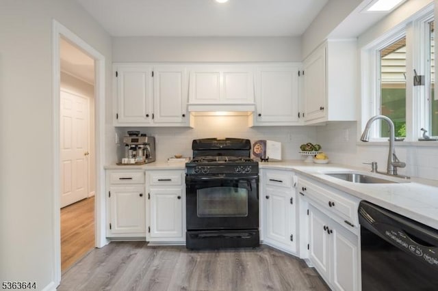 27 Brook Rd, New Providence Boro, NJ 07974 - kitchen featuring black appliances, white cabinetry, light countertops, tasteful backsplash, and recessed lighting