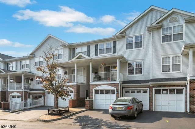 1111 Worthington Ct, Denville Twp, NJ 07834 - townhome / multi-family property with an attached garage, driveway, and brick siding