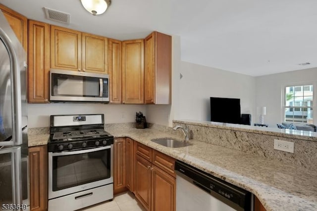 1111 Worthington Ct, Denville Twp, NJ 07834 - kitchen with appliances with stainless steel finishes, light stone countertops, and open floor plan