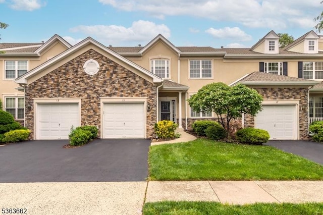 15 Fernwood Ct, Readington Twp, NJ 08889 - view of property featuring stone siding, asphalt driveway, stucco siding, and a front lawn