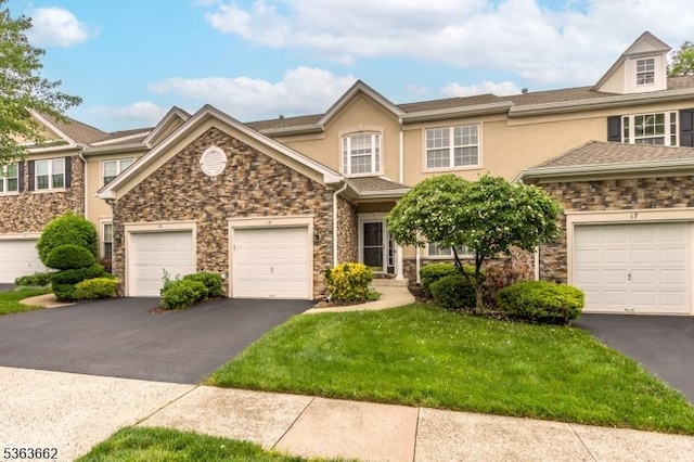 15 Fernwood Ct, Readington Twp, NJ 08889 - townhome / multi-family property with stone siding, asphalt driveway, stucco siding, and a front yard