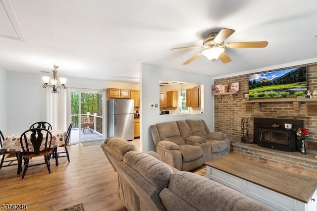 54 Stevens Trl, Hopatcong Boro, NJ 07843 - living area featuring light wood finished floors, a ceiling fan, a chandelier, and attic access