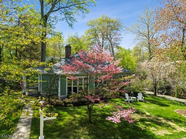 135 Weston Ave, Chatham Boro, NJ 07928 - rear view of property featuring a chimney and a yard