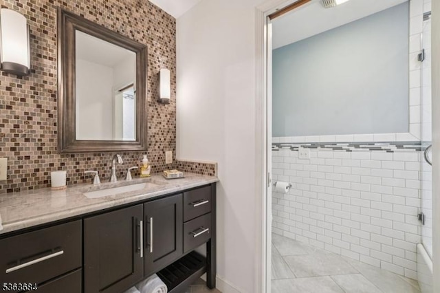 135 Weston Ave, Chatham Boro, NJ 07928 - full bath with vanity, tile walls, and tile patterned flooring