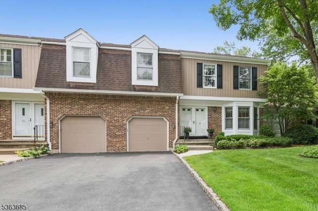 48 Dexter Dr N, Bernards Twp, NJ 07920 - townhome / multi-family property with driveway, an attached garage, a front yard, a shingled roof, and brick siding