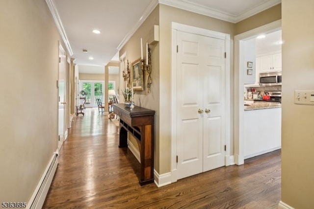 48 Dexter Dr N, Bernards Twp, NJ 07920 - hall with baseboard heating, dark wood-style flooring, recessed lighting, and crown molding