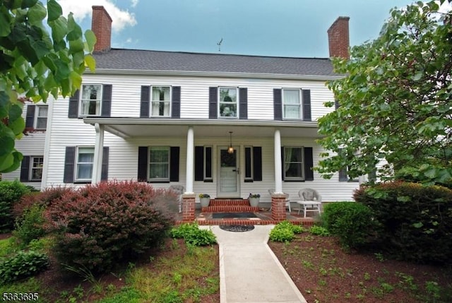 1135 State Route 28, Branchburg Twp, NJ 08876 - view of front of property with a chimney and covered porch
