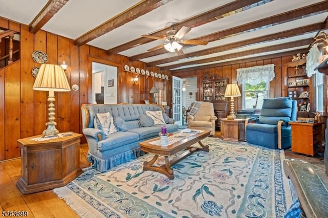 6 Penn Ave, Andover Twp, NJ 07860 - living room featuring beam ceiling, wooden walls, ceiling fan, and wood finished floors