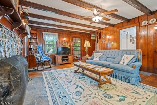 6 Penn Ave, Andover Twp, NJ 07860 - living area featuring beamed ceiling, wooden walls, a ceiling fan, and wood finished floors