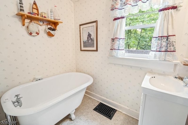 6 Penn Ave, Andover Twp, NJ 07860 - full bath featuring a soaking tub, vanity, and wallpapered walls