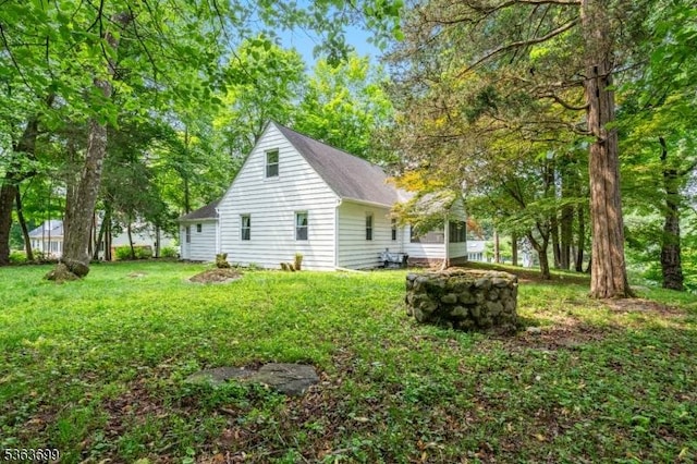 6 Penn Ave, Andover Twp, NJ 07860 - view of home's exterior with a lawn and roof with shingles
