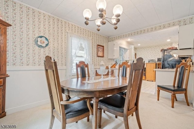 6 Penn Ave, Andover Twp, NJ 07860 - dining room with wallpapered walls, ornamental molding, a chandelier, wainscoting, and light carpet
