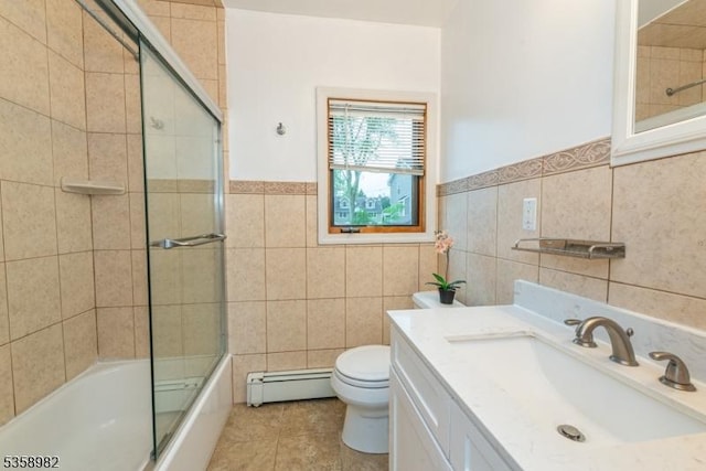 65 Beechwood Ave, Parsippany-Troy Hills Twp, NJ 07034 - full bathroom with a baseboard radiator, tile walls, tile patterned floors, a wainscoted wall, and vanity
