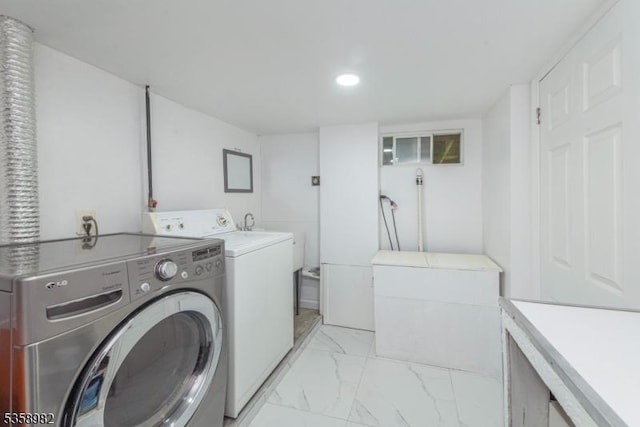 65 Beechwood Ave, Parsippany-Troy Hills Twp, NJ 07034 - laundry area with independent washer and dryer, light marble finish flooring, and recessed lighting