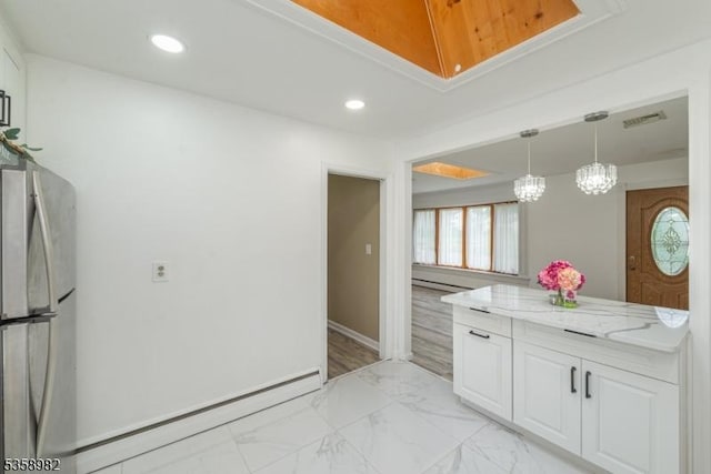 65 Beechwood Ave, Parsippany-Troy Hills Twp, NJ 07034 - kitchen with freestanding refrigerator, healthy amount of natural light, white cabinets, light stone countertops, and recessed lighting