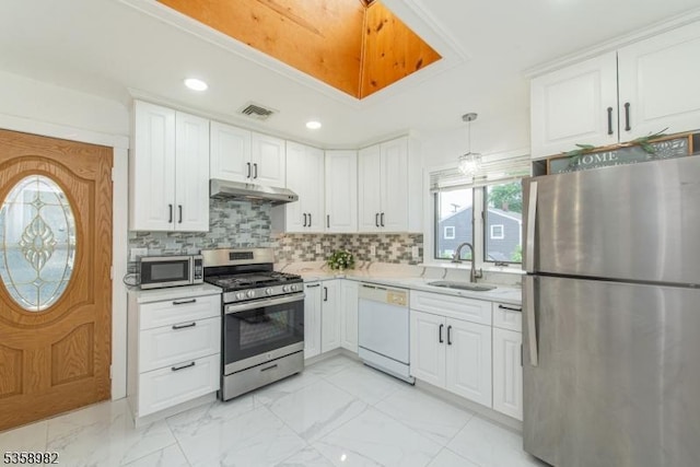 65 Beechwood Ave, Parsippany-Troy Hills Twp, NJ 07034 - kitchen featuring stainless steel appliances, under cabinet range hood, light countertops, decorative backsplash, and white cabinetry