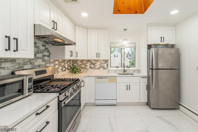 65 Beechwood Ave, Parsippany-Troy Hills Twp, NJ 07034 - kitchen with stainless steel appliances, under cabinet range hood, backsplash, white cabinets, and recessed lighting
