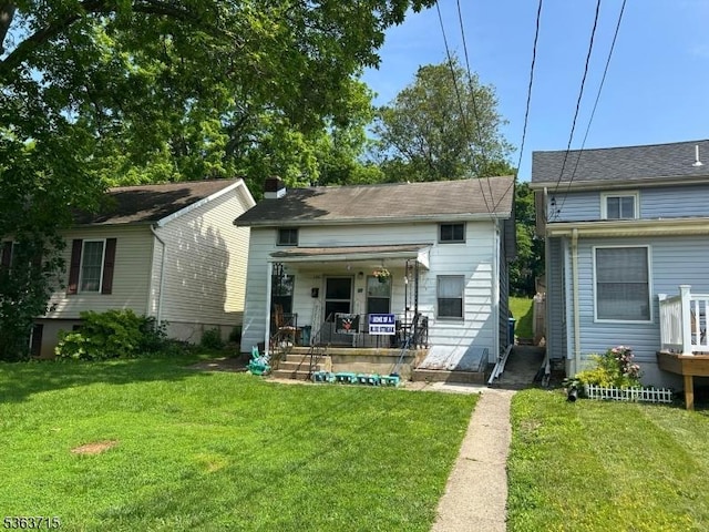 100 Myrtle Ave, Washington Boro, NJ 07882 - view of front facade with a porch and a front lawn