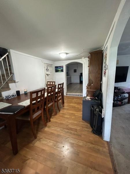 100 Myrtle Ave, Washington Boro, NJ 07882 - dining room featuring arched walkways and light wood finished floors