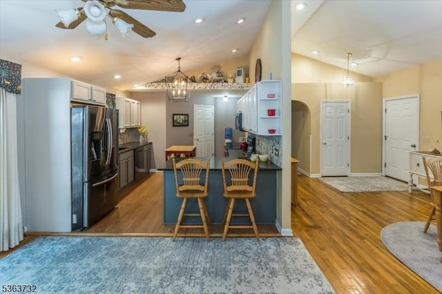130 Lake Iliff Rd, Andover Twp, NJ 07860 - kitchen featuring stainless steel fridge with ice dispenser, lofted ceiling, a ceiling fan, open shelves, and light wood finished floors