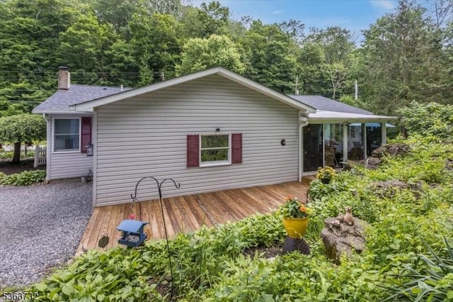 130 Lake Iliff Rd, Andover Twp, NJ 07860 - rear view of property featuring a deck and roof with shingles