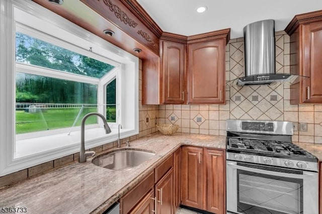 750 Saint Georges Rd, Bridgewater Twp, NJ 08807 - kitchen featuring stainless steel range with gas stovetop, wall chimney range hood, light stone counters, tasteful backsplash, and brown cabinets