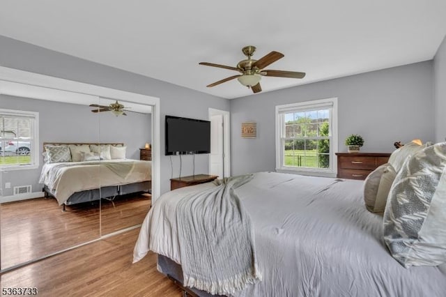750 Saint Georges Rd, Bridgewater Twp, NJ 08807 - bedroom with wood finished floors and ceiling fan