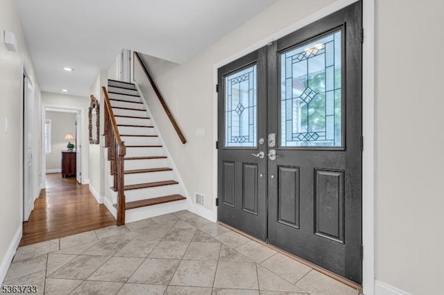 750 Saint Georges Rd, Bridgewater Twp, NJ 08807 - entrance foyer featuring stairs, french doors, recessed lighting, and light tile patterned floors