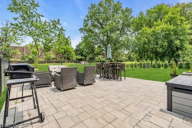 750 Saint Georges Rd, Bridgewater Twp, NJ 08807 - fenced backyard featuring a patio area, an outdoor hangout area, view of scattered trees, and outdoor dining space